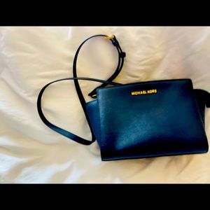 Navy blue cross body Michael Kors purse